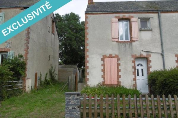 Jolie maison avec  un terrain attenant.