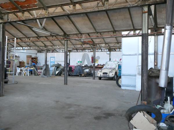 Ancienne usine de tissage avec habitation et terrain constructible
