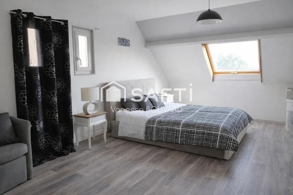 Maison familiale avec double rentabilité locative