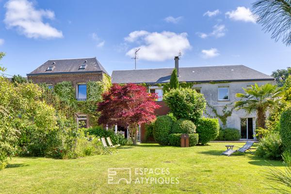 Maison de caractère abritée au coeur d’un jardin paysager d’exception