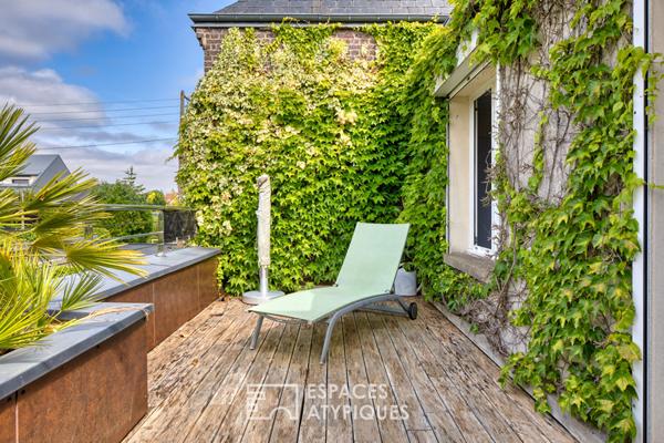 Maison de caractère abritée au coeur d’un jardin paysager d’exception