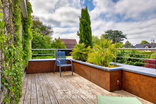 Maison de caractère abritée au coeur d’un jardin paysager d’exception