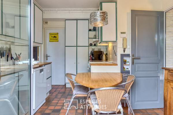 Maison de caractère abritée au coeur d’un jardin paysager d’exception