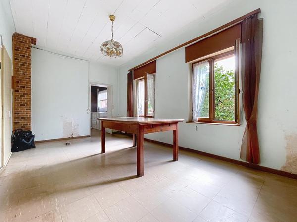 Maison avec de beaux volumes et à fort potentiel
