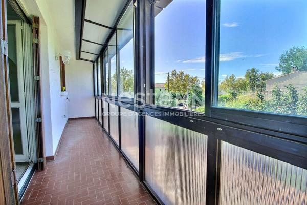 Marignane- Appartement 3/4 pièces d'une surface de 78 m² avec une véranda et un jardin.