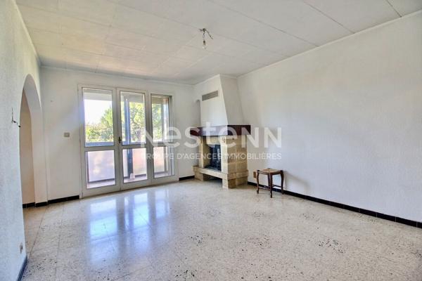 Marignane- Appartement 3/4 pièces d'une surface de 78 m² avec une véranda et un jardin.