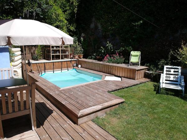 Appartement duplex avec piscine, jardin et vue