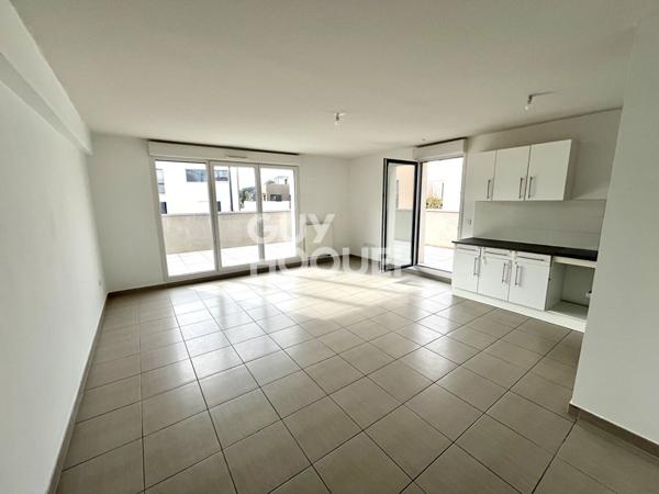 Centre ville : T4 85m² + terrasse 60m2 + box + parking