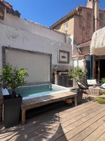 Marseille (13007) VENTE APPARTEMENT DUPLEX COMME UNE MAISON TYPE 4 81,59 M2 CARREZ (110 M2 HABITABLE) JARDIN TERRASSE BASSIN ST