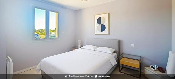 Maison de plain pied récente avec 2 chambres, garage et terrain de 1000 m2