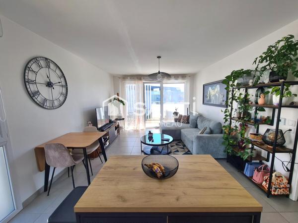 Appartement T3 balcon deux places de parking