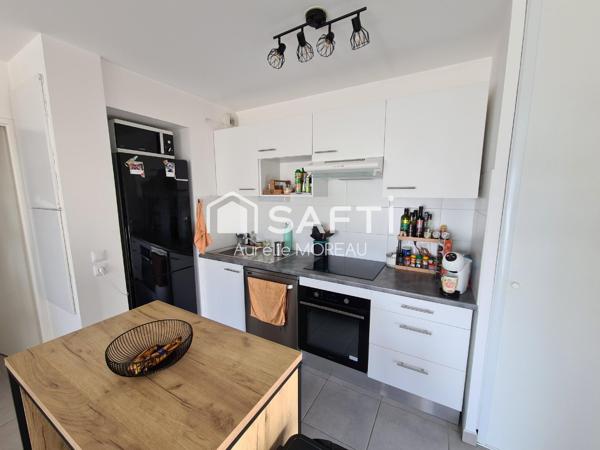 Appartement T3 balcon deux places de parking