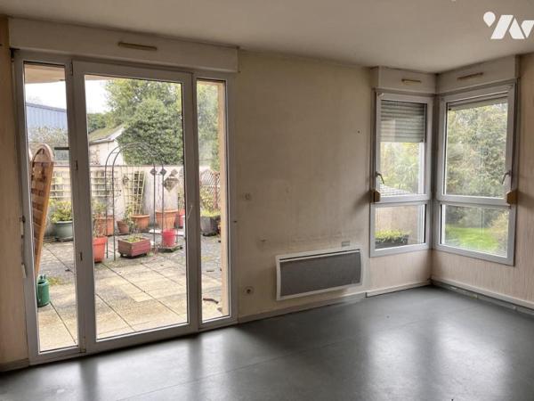 Appartement de type 4 avec deux terrasses, cave et garage