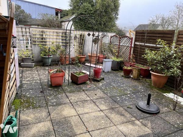 Appartement de type 4 avec deux terrasses, cave et garage