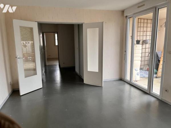 Appartement de type 4 avec deux terrasses, cave et garage