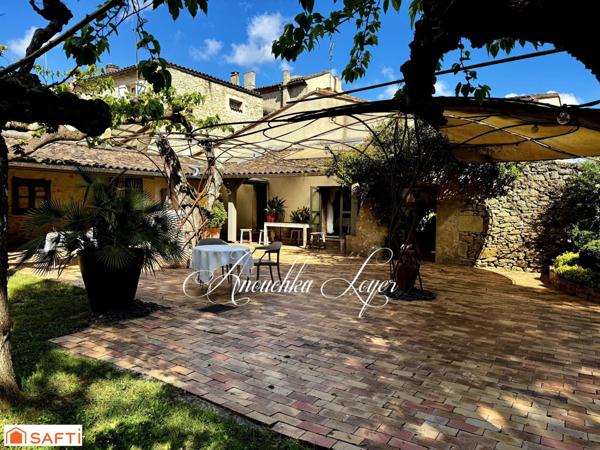 ENSEMBLE IMMOBILIER AVEC MURS ET FOND DE COMMERCE