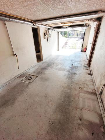Maison individuelle avec sous-sol total sur 411 m² de terrain.
