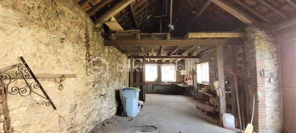 Dans un charmant village à 20 km de Chartres et Auneau et quelques minutes de Sours, découvrez cette maison atypique et familiale de 114 m², habitable de plain-pied et édifiée dans une ancienne chapelle.
 - ATTENTION : La partie arrondie est restée consacrée et ne fait partie du bien en vente -

Dès que vous franchirez le portail, vous serez séduit par le côté intimiste du jardin qui est clos de murs, arboré et sans vis à vis.
L'entrée dessert une pièce de vie de 27 m² avec cheminée et une cuisine lumineuse de 13,5 m². Ces 2 pièces donnent accès à la terrasse par de grandes portes-fenêtres. Le RdC dispose également de 2 chambres ( 11 m² et 9 m²), une salle d'eau-WC et une buanderie. 
A l'étage, une charmante pièce palière dessert 2 chambres (9 m² et 12,5 m²) ainsi qu'un petit grenier aménageable.

Chauffage radiateurs tubulaires avec chaudière électrique. Cheminée à foyer ouvert avec bouches de chaleurs à l'étage.
Huisseries : châssis bois simple vitrage, avec survitrage et double-vitrage.
Assainissement non collectif non conforme mais opérationnel (bac de dégraissage et fosse septique avec épandage).

+ Les PLUS + :
  - Dépendance de 56m² et 5 m de haut pour stockage, garage et aménageable ;
  - Jardin sans aucun vis-à-vis et environnement calme ;
  - Petite cave voûtée ;
  - Portail électrique ;
  - Alarme dont el contrat peut être transféré ;
  - Raccordé fibre.

Travaux à prévoir :
  - Une partie de la couverture donnant sur la rue à changer avec lucarnes à remplacer ;
  - Revêtement muraux et sols à rafraichir en grande partie
  - Cuisine et salle d'eau à rénover 
  - Une partie de l'électricité à remettre aux normes

Pour améliorer la performance énergétique :
  - Une grande partie des fenêtres et des volets à changer ;
  - Isolation des murs ;
  - Isolation de la toiture ;
  - Pose d'une pompe à chaleur air-eau et ballon thermodynamique ;
  - Pose dune VMC double-flux.

Taxe foncière 2026 : 744 €

Si cette maison à fort potentiel correspond à vos attentes, appelez-moi !
  .