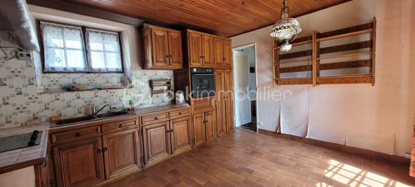 Dans un charmant village à 20 km de Chartres et Auneau et quelques minutes de Sours, découvrez cette maison atypique et familiale de 114 m², habitable de plain-pied et édifiée dans une ancienne chapelle.
 - ATTENTION : La partie arrondie est restée consacrée et ne fait partie du bien en vente -

Dès que vous franchirez le portail, vous serez séduit par le côté intimiste du jardin qui est clos de murs, arboré et sans vis à vis.
L'entrée dessert une pièce de vie de 27 m² avec cheminée et une cuisine lumineuse de 13,5 m². Ces 2 pièces donnent accès à la terrasse par de grandes portes-fenêtres. Le RdC dispose également de 2 chambres ( 11 m² et 9 m²), une salle d'eau-WC et une buanderie. 
A l'étage, une charmante pièce palière dessert 2 chambres (9 m² et 12,5 m²) ainsi qu'un petit grenier aménageable.

Chauffage radiateurs tubulaires avec chaudière électrique. Cheminée à foyer ouvert avec bouches de chaleurs à l'étage.
Huisseries : châssis bois simple vitrage, avec survitrage et double-vitrage.
Assainissement non collectif non conforme mais opérationnel (bac de dégraissage et fosse septique avec épandage).

+ Les PLUS + :
  - Dépendance de 56m² et 5 m de haut pour stockage, garage et aménageable ;
  - Jardin sans aucun vis-à-vis et environnement calme ;
  - Petite cave voûtée ;
  - Portail électrique ;
  - Alarme dont el contrat peut être transféré ;
  - Raccordé fibre.

Travaux à prévoir :
  - Une partie de la couverture donnant sur la rue à changer avec lucarnes à remplacer ;
  - Revêtement muraux et sols à rafraichir en grande partie
  - Cuisine et salle d'eau à rénover 
  - Une partie de l'électricité à remettre aux normes

Pour améliorer la performance énergétique :
  - Une grande partie des fenêtres et des volets à changer ;
  - Isolation des murs ;
  - Isolation de la toiture ;
  - Pose d'une pompe à chaleur air-eau et ballon thermodynamique ;
  - Pose dune VMC double-flux.

Taxe foncière 2026 : 744 €

Si cette maison à fort potentiel correspond à vos attentes, appelez-moi !
  .