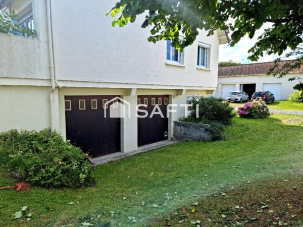 Appartement-maison - 90m² - 3 ch - Garage de 23m²