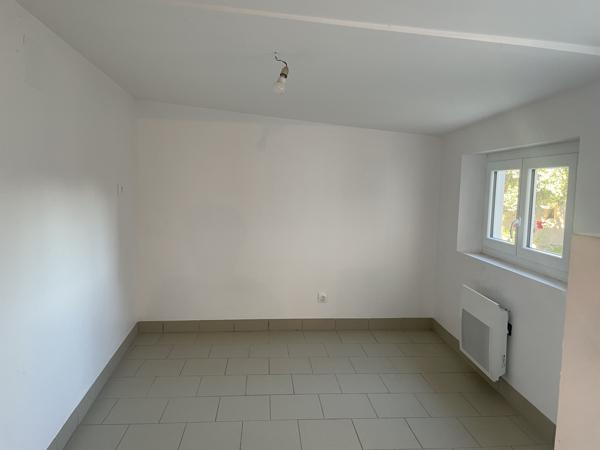 MAISON DE BOURG AVEC TERRAIN ET DEPENDANCES