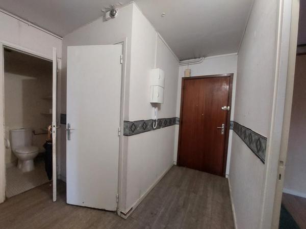 Appartement + 2 caves + parking privatif