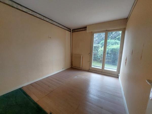 Appartement + 2 caves + parking privatif