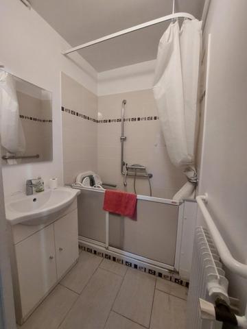 Appartement + 2 caves + parking privatif