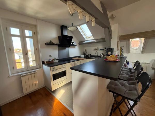 Charmant "pied à terre" avec deux terrasses au centre ville