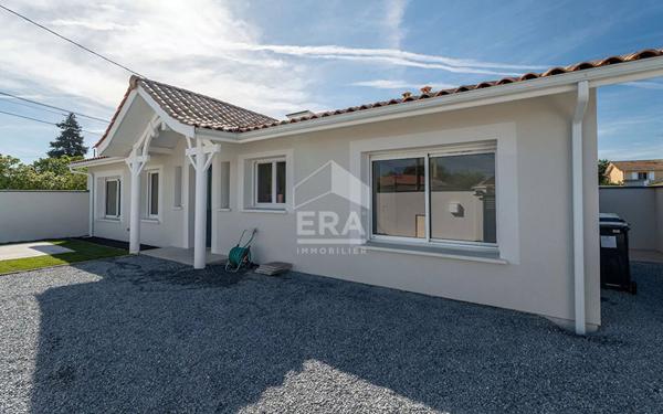 Appartement de plein pied avec jardin privatif