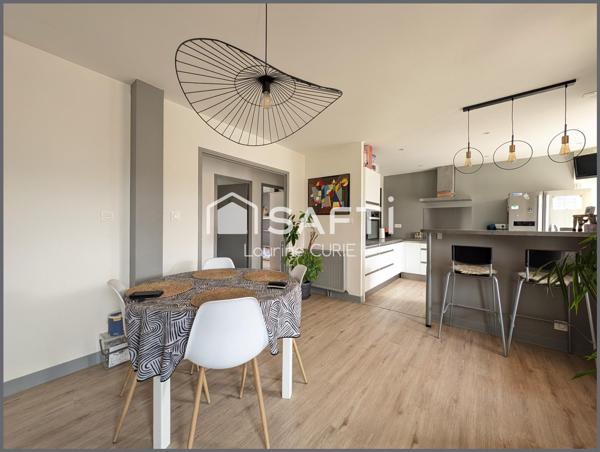 Appartement T3 avec balcon, garage et jardin