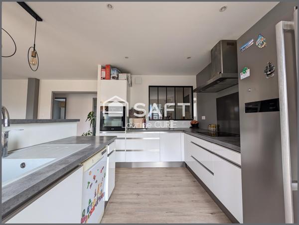 Appartement T3 avec balcon, garage et jardin