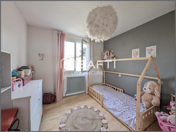 Appartement T3 avec balcon, garage et jardin