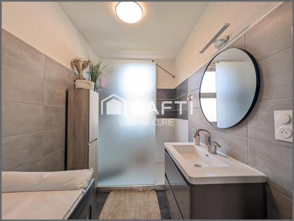 Appartement T3 avec balcon, garage et jardin