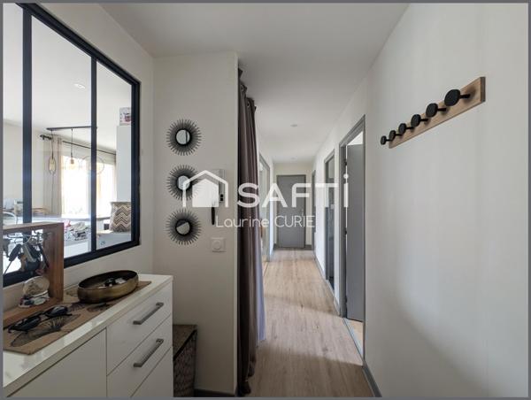 Appartement T3 avec balcon, garage et jardin