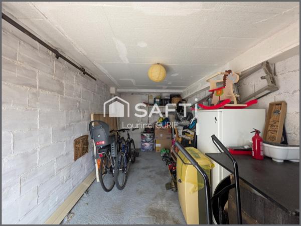 Appartement T3 avec balcon, garage et jardin