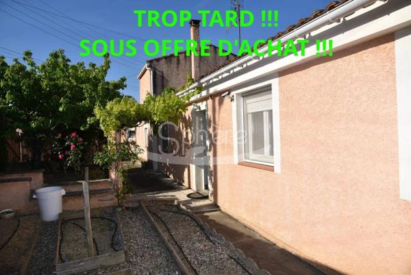 Maison de plain pied avec garage camping car