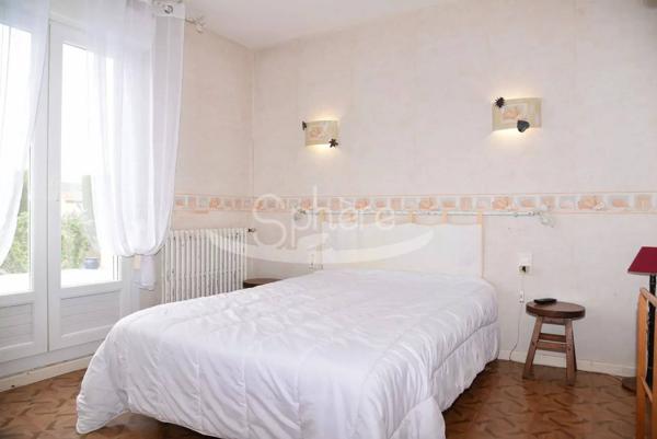 Maison de plain pied avec garage camping car