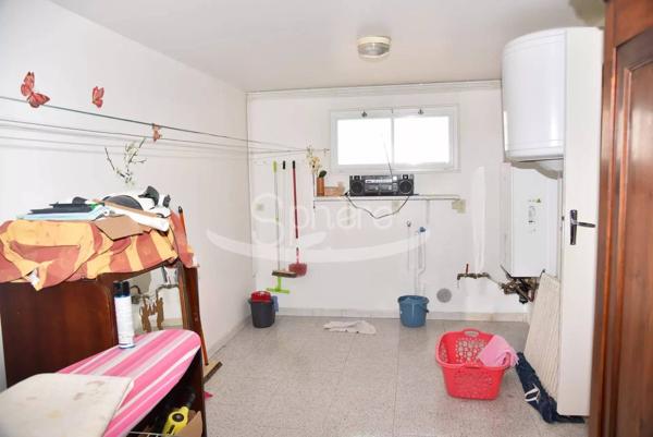 Maison de plain pied avec garage camping car