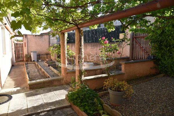 Maison de plain pied avec garage camping car