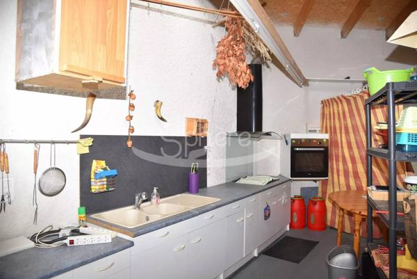 Maison de plain pied avec garage camping car