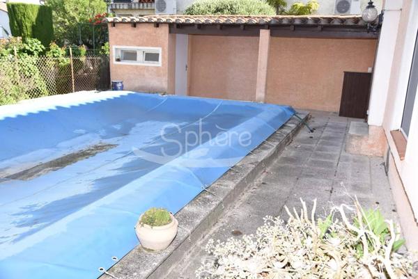 Maison de plain pied avec garage camping car