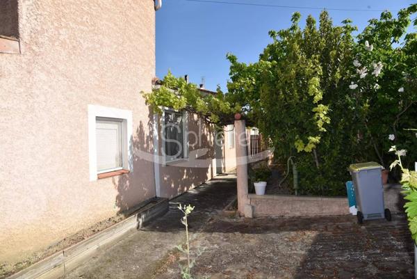 Maison de plain pied avec garage camping car