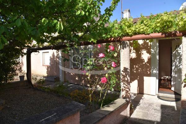 Maison de plain pied avec garage camping car