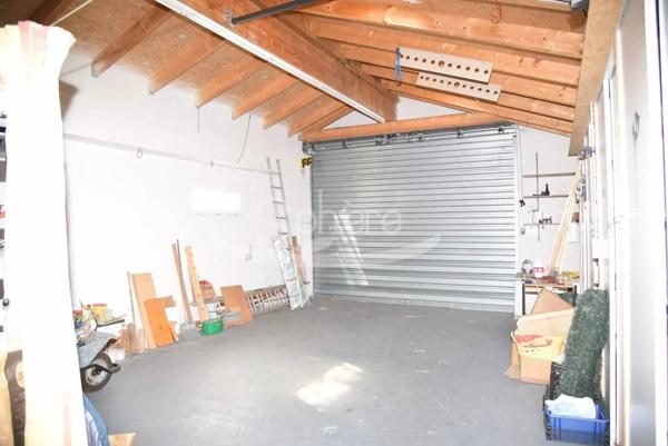 Maison de plain pied avec garage camping car