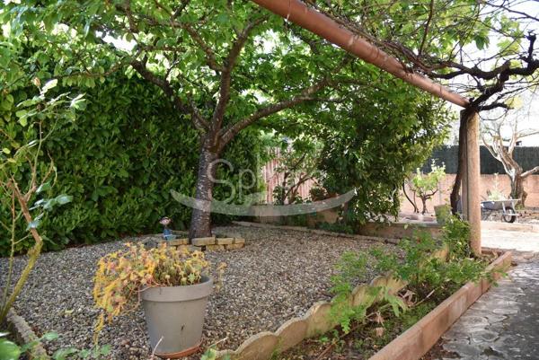 Maison de plain pied avec garage camping car
