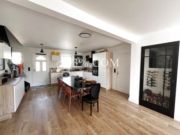 Maison 6 pièce(s) 4 chambre(s) 210 m²