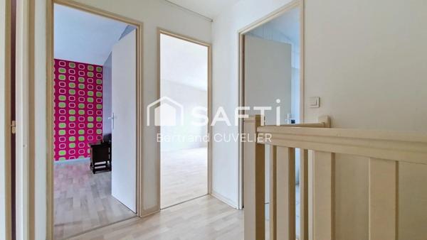 Maison T4 de 91 m² en lotissement avec garage et jardin