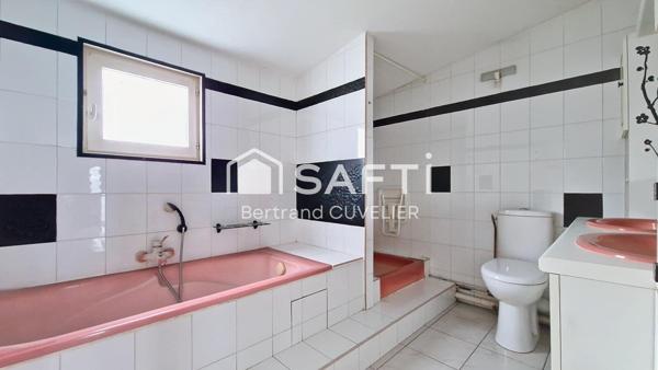 Maison T4 de 91 m² en lotissement avec garage et jardin