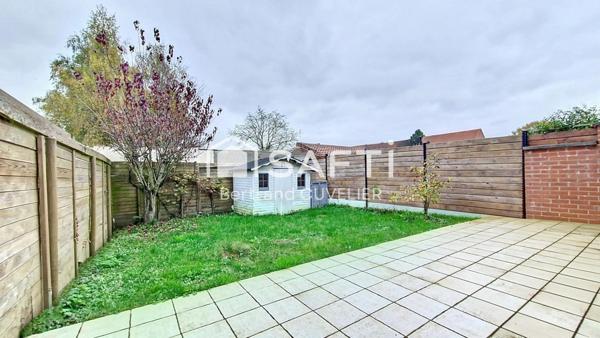 Maison T4 de 91 m² en lotissement avec garage et jardin